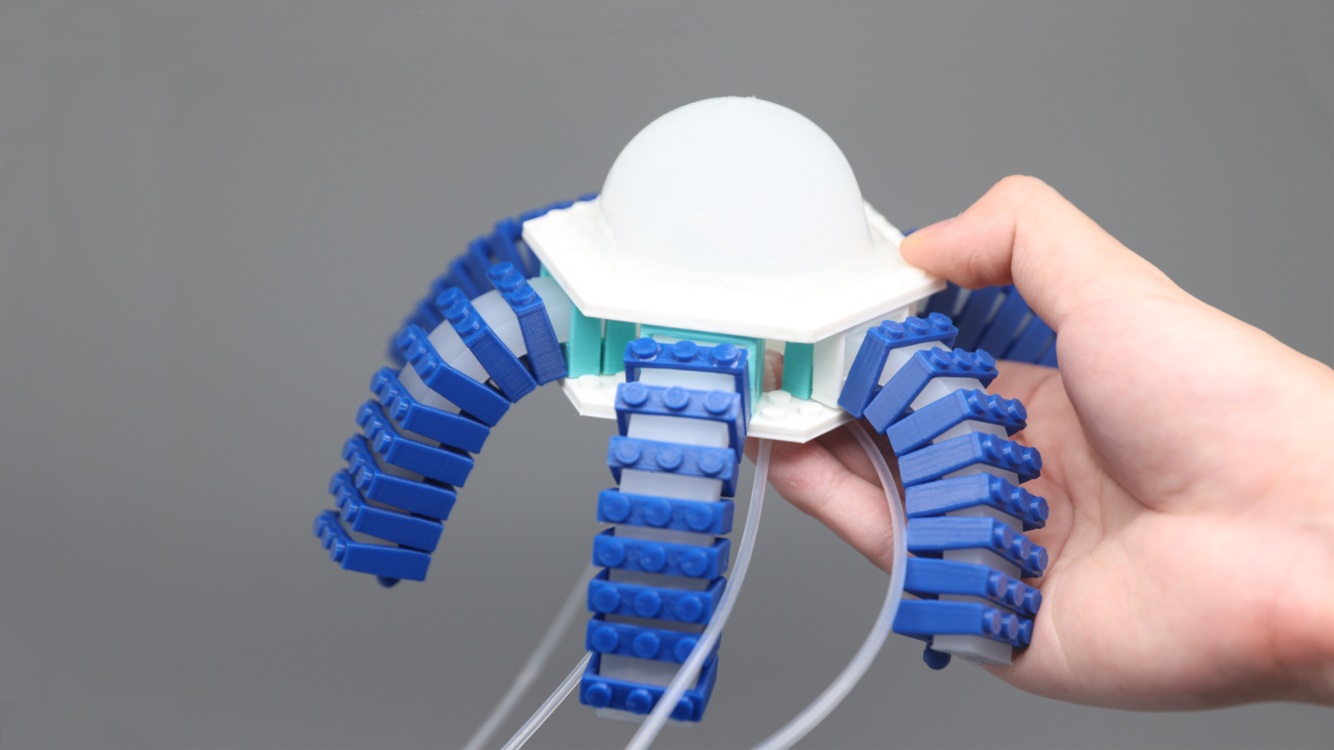 KiPneu: Designing a Constructive Pneumatic Platform for Biomimicry Learning in STEAM Education